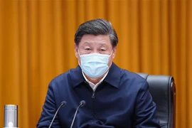 Chủ tịch Trung Quốc Tập Cận Bình trong chuyến thăm Vũ Hán, tỉnh Hồ Bắc, ngày 10/3. (Ảnh: THX/TTXVN)
