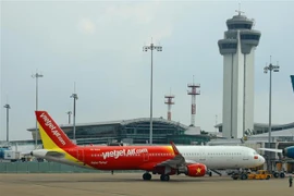 Máy bay của VietjetAir tại sân bay quốc tế Tân Sơn Nhất (TP Hồ Chí Minh). (Ảnh: Ngọc Hà/TTXVN)