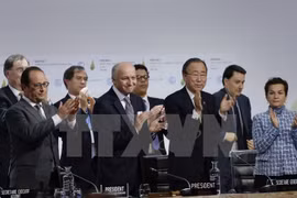 Thỏa thuận chống biến đổi khí hậu toàn cầu đã được Hội nghị COP21 thông qua. (Nguồn: AFP/TTXVN)
