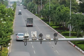 Các camera và máy đo tốc độ được gắn tại các trục đường, giao lộ. (Ảnh: Sỹ Tuyên/TTXVN)