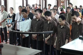 Các bị cáo tại phiên toà. (Ảnh: Tất Thành/TTXVN) 