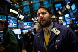 Các giao dịch viên tại sàn New York. (Nguồn: AFP/TTXVN)