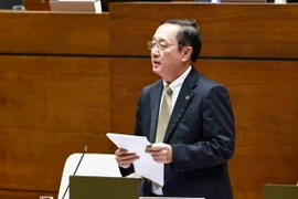 Bộ trưởng Bộ Khoa học và Công nghệ Huỳnh Thành Đạt giải trình, làm rõ một số vấn đề đại biểu Quốc hội nêu. (Ảnh: Doãn Tấn/TTXVN)