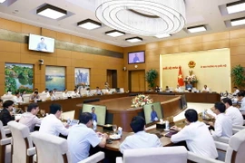 Ủy ban Thường vụ Quốc hội tổ chức cuộc họp để xem xét, quyết định về việc sắp xếp đơn vị hành chính cấp huyện, xã giai đoạn 2023-2025 của 21 tỉnh, thành phố. (Ảnh: Doãn Tấn/TTXVN)