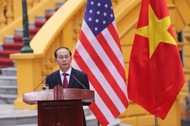 Chủ tịch nước Trần Đại Quang phát biểu sau cuộc hội đàm với Tổng thống Hoa Kỳ Donald Trump. (Ảnh: Minh Sơn)