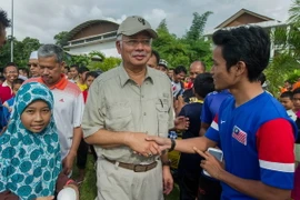 "Malaysia sẽ bước sang năm mới 2015 với tinh thần mạnh mẽ"