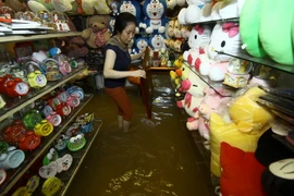 Nước ngập vào tận nhà dân tại quận Ninh Kiều. (Ảnh: Duy Khương/TTXVN)