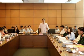 Đại biểu Quốc hội các tỉnh Phú Yên-Đồng Nai-Bắc Giang thảo luận tại tổ. (Ảnh: Phương Hoa/TTXVN)