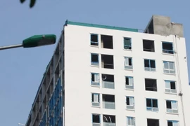 Phần xây vượt 16m, tương đương 5 tầng, so với giấy phép xây dựng của tòa nhà 8B Lê Trực. (Ảnh: Tuấn Anh/TTXVN)