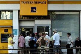 Một ngân hàng ở thủ đô Athens mở cửa ngày 20/7. (Nguồn: AFP/TTXVN)