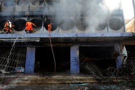 Hiện trường một vụ đánh bom ở Sungai Kolok, tỉnh Narathiwat, miền Nam Thái Lan ngày 11/7. (Nguồn: AFP/TTXVN)
