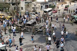 Hiện trường một vụ đánh bom tại thành phố cảng Latakia của Syria. (Nguồn: AFP/TTXVN)