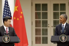 Tổng thống Mỹ Barack Obama (phải) và Chủ tịch Trung Quốc Tập Cận Bình (trái) tại cuộc họp báo chung ở Nhà Trắng ngày 25/9. (Nguồn: Reuters/TTXVN)
