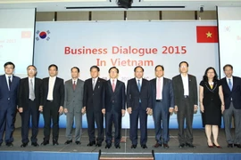 Phó Chủ tịch UBND TP.Hồ Chí Minh Tất Thành Cang và các đại biểu tham dự hội nghị. (Ảnh: Thanh Vũ/ TTXVN)