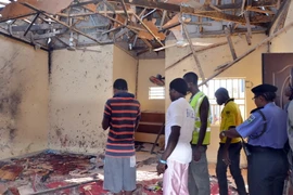 Hiện trường vụ đánh bom ở Maiduguri ngày 23/10 mà Boko Haram là thủ phạm. (Nguồn: AFP/TTXVN)