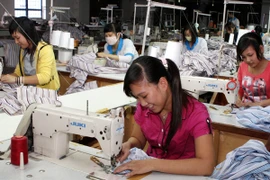 Dệt may sẽ là một trong những ngành hưởng lợi lớn khi TPP được ký kết (Ảnh: TTXVN)