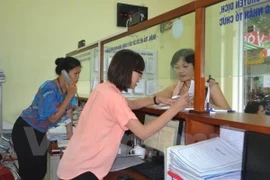 Tăng cường cải cách thủ tục hành chính về đất đai. (Ảnh: PV/Vietnam+)