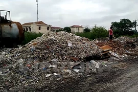 Ô nhiễm môi trường tại làng nghề sản xuất giấy Phong Khê, tỉnh Bắc Ninh. (Ảnh: Hùng Võ/Vietnam+)