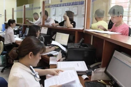 Hà Nội cấp sổ đỏ trong vòng 14 ngày. (Ảnh: CTV/Vietnam+)