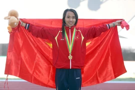 Sự góp mặt của vận động viên Phạm Thị Bình giúp giải đấu năm nay trở nên vô cùng hâp dẫn. (Ảnh: Quang Nhựt/TTXVN)