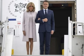 Tổng thống Pháp Emmanuel Macron và Phu nhân. (Nguồn: AP)