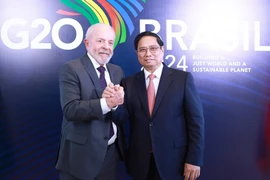 Thủ tướng Phạm Minh Chính và Tổng thống Brazil Luiz Inácio Lula da Silva. (Ảnh: Dương Giang/TTXVN)