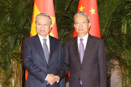 Tổng Bí thư, Chủ tịch nước Tô Lâm hội kiến Ủy viên trưởng Nhân đại toàn quốc Trung Quốc Triệu Lạc Tế. (Ảnh: Trí Dũng/TTXVN)