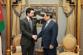Thủ tướng Phạm Minh Chính gặp Hoàng Thái tử Jordan - Al Hussein Bin Abdullah II. (Ảnh: Dương Giang/TTXVN)