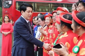 Chủ tịch nước Lương Cường gặp mặt đại biểu phụ nữ cao tuổi tiêu biểu toàn quốc. (Ảnh: Lâm Khánh/TTXVN)