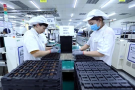 Dây chuyền sản xuất bản mạch điện tử tại Công ty TNHH Nexcon Việt Nam, vốn đầu tư của Hàn Quốc tại Bắc Ninh. (Ảnh: Danh Lam/TTXVN) 