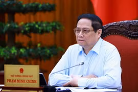 Thủ tướng Phạm Minh Chính chủ trì họp thúc đẩy tiến độ triển khai dự án đường dây 500kv mạch 3 và cung ứng điện tháng cao điểm. (Ảnh: Dương Giang/TTXVN)