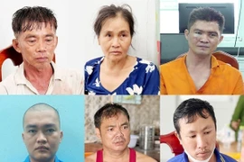 Các đối tượng (từ trái sang phải) Lê Văn Điền, Lê Thị Ngọc Nhan, Lê Phước Sang, Lê Phước Hoàng, Lê Công Triết và Nguyễn Văn Lộc. (Ảnh: TTXVN phát)