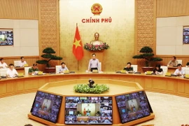 Phó Thủ tướng Trần Lưu Quang chủ trì hội nghị. (Ảnh: Lâm Khánh/TTXVN)