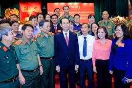 Chủ tịch nước Trần Đại Quang với các đại biểu. (Ảnh: Nhan Sáng/TTXVN)