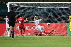 Pha ghi bàn tung lưới Olympic Syria của tuyển thủ Nguyễn Văn Toàn (số 8) trong trận tứ kết bóng đá nam ASIAD 2018 ở Bekasi ngày 27/8. (Ảnh: AFP/ TTXVN)