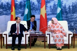 Chủ tịch nước Trần Đại Quang hội kiến với Quyền Chủ tịch Ủy ban Liên minh châu Phi Amira Mohammed Elfadin. (Ảnh: Nhan Sáng/TTXVN)