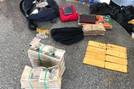 Số tang vật bị tạm giữ để điều tra. (Ảnh: Công Mạo/TTXVN)