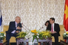 Chủ tịch UBND Thành phố Hồ Chí Minh Nguyễn Thành Phong hội kiến Tổng thống Israel Reuven Rivlin đang thăm cấp Nhà nước Việt Nam. (Ảnh: Thanh Vũ/TTXVN)