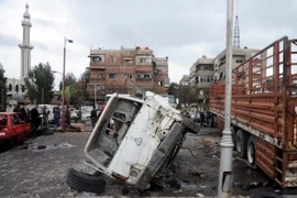 Hiện trường sau vụ đánh bom ở Damascus, Syria ngày 11/3. (Nguồn: THX/TTXVN)