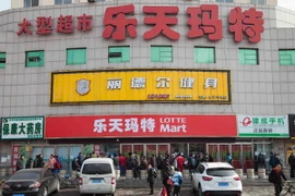 Một cửa hàng Lotte Mart bị đóng cửa ở tỉnh Cát Lâm (Trung Quốc) ngày 9/3. (Nguồn: AFP/TTXVN)