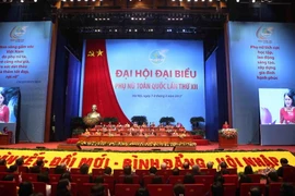 Bà Nguyễn Thị Thu Hà, Ủy viên Trung ương Đảng, Chủ tịch Hội Liên hiệp Phụ nữ Việt Nam khóa XI đọc diễn văn khai mạc Đại hội. (Ảnh: TTXVN)