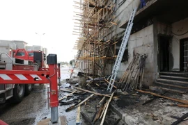 Cảnh đổ nát sau một vụ giao tranh giữa một nhóm các tay súng ở thủ đô Tripoli ngày 15/3. (Nguồn: THX/TTXVN)