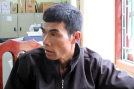 Đối tượng Đoàn Văn Nghĩa tại cơ quan điều tra Công an tỉnh Lai Châu. (Ảnh: Công Hải-Mạnh Hùng/TTXVN)