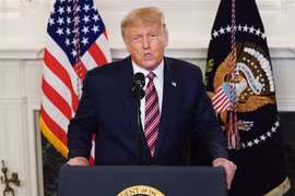 Tổng thống Mỹ Donald Trump phát biểu tại Nhà Trắng ở Washington, D.C., Mỹ. (Ảnh: AFP/TTXVN)