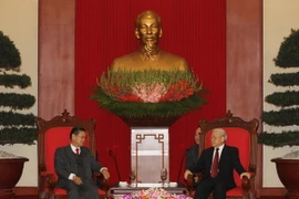 Tổng Bí thư tiếp đoàn đại biểu cấp cao Chính phủ Lào 