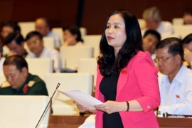 Đại biểu Quốc hội tỉnh Vĩnh Phúc Hồ Thị Thủy phát biểu ý kiến. (Ảnh: Phạm Kiên/TTXVN)
