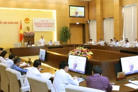 Chủ tịch Quốc hội Nguyễn Sinh Hùng phát biểu khai mạc Hội nghị đại biểu Quốc hội hoạt động chuyên trách thảo luận về một số nội dung trình Quốc hội tại kỳ họp thứ 10, Quốc hội khóa 13. (Ảnh: Nhan Sáng/TTXVN)