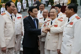 Chủ tịch nước Trương Tấn Sang với các thế hệ tướng lĩnh Công an qua các thời kỳ. (Ảnh: Nguyễn Khang/TTXVN)