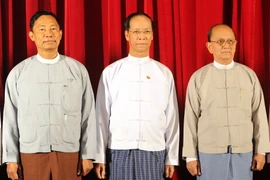 Tổng thống Myanmar Thein Sein (phải) cam kết tiến hành bầu cử tự do và công bằng. (Ảnh: AFP/TTXVN)