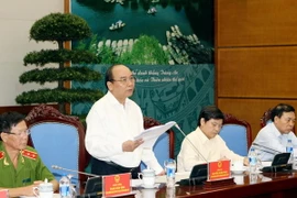 Phó Thủ tướng Nguyễn Xuân Phúc phát biểu kết luận Hội nghị. (Ảnh: Phạm Kiên/TTXVN)